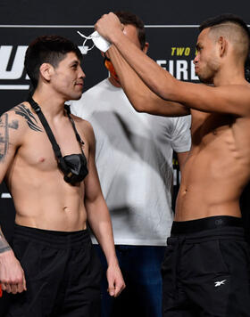 Brandon Moreno of Mexico and Brandon Royval face off during the UFC 255 weigh-in at UFC APEX on November 20, 2020 in Las Vegas, Nevada. (Photo by Jeff Bottari/Zuffa LLC)